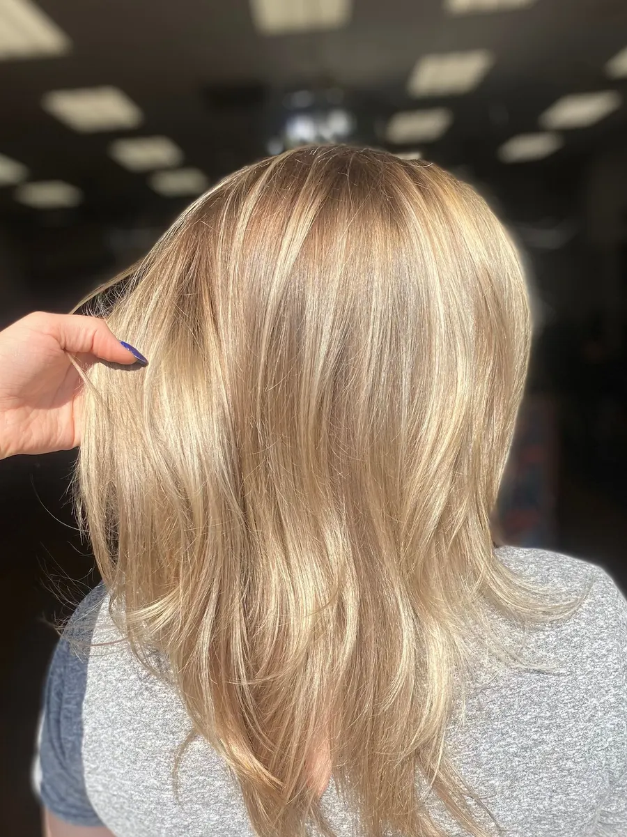 Soft dimensional blonde with face-framing layers