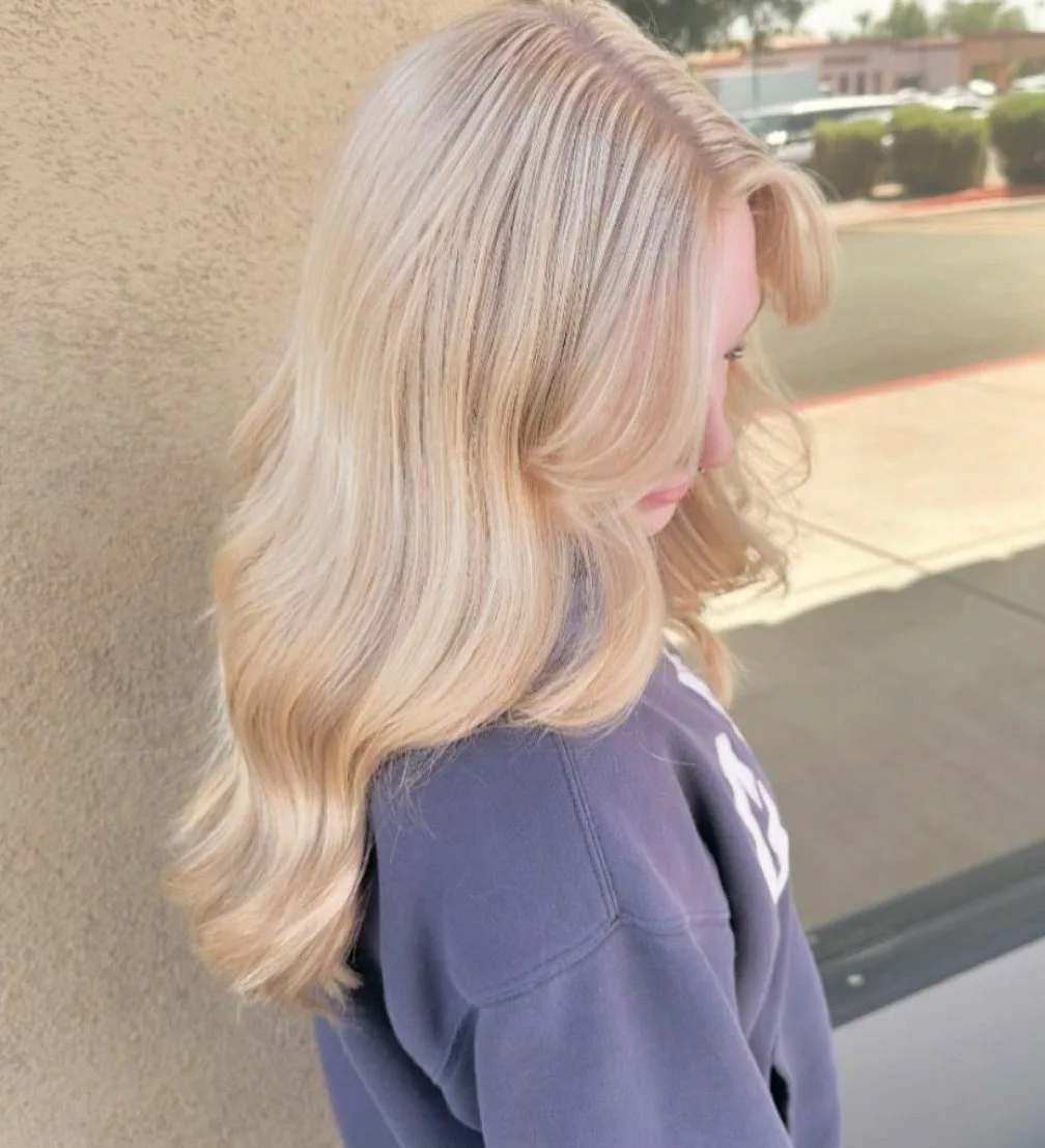 Bright, soft blonde waves photographed outdoors