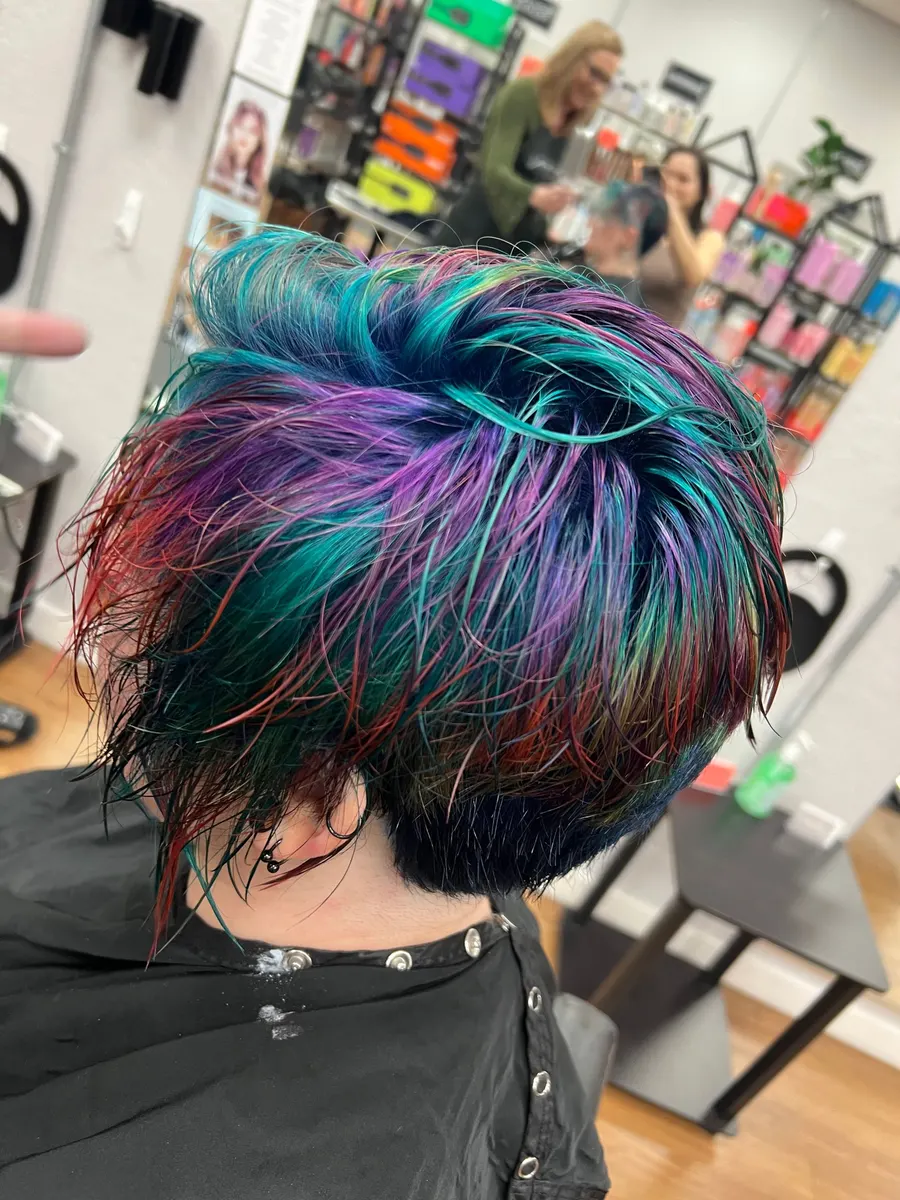 Short cut with green, purple, and blue vivid tones
